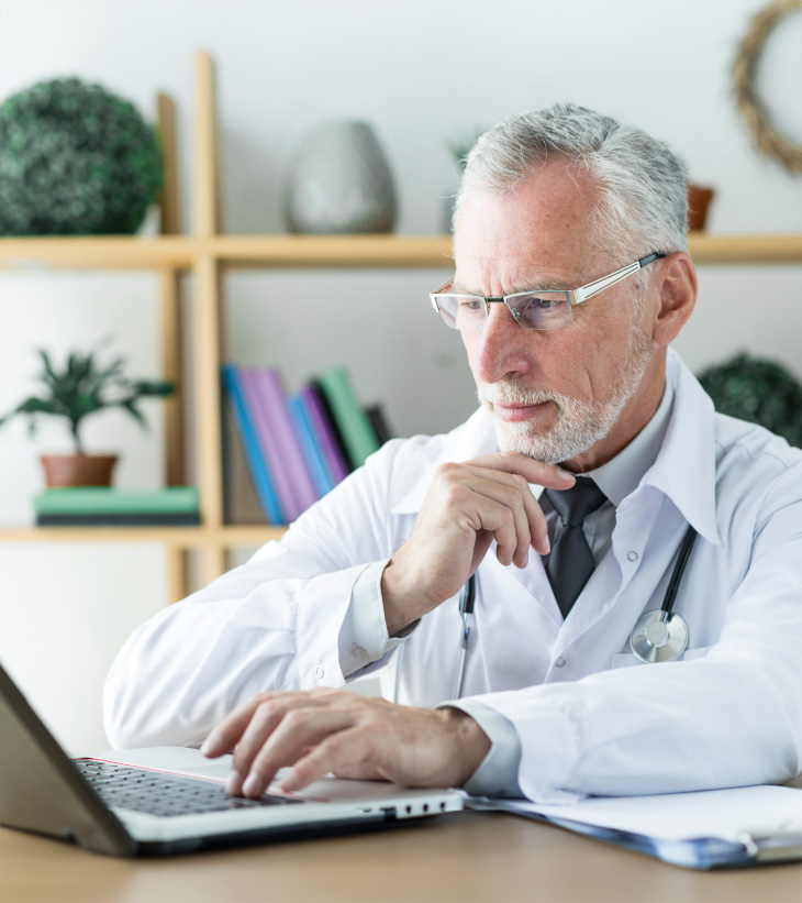 Physician looking at screen